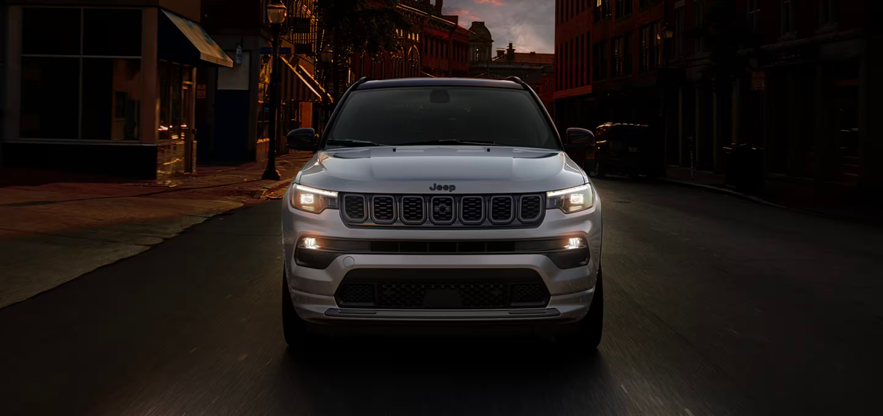 2024 Jeep Compass driving through city